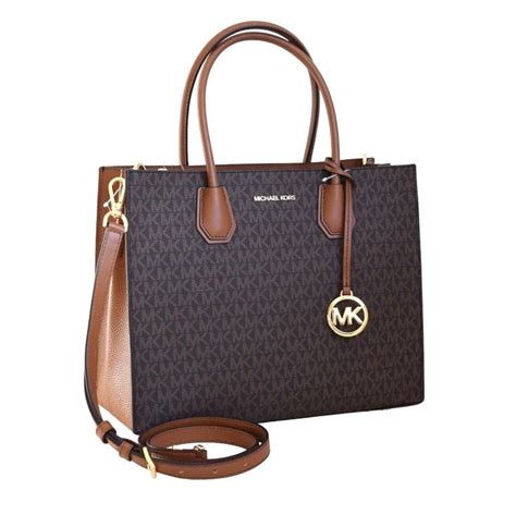 michael kors tasche und geldbörsen|Michael Kors opened satchel purse.